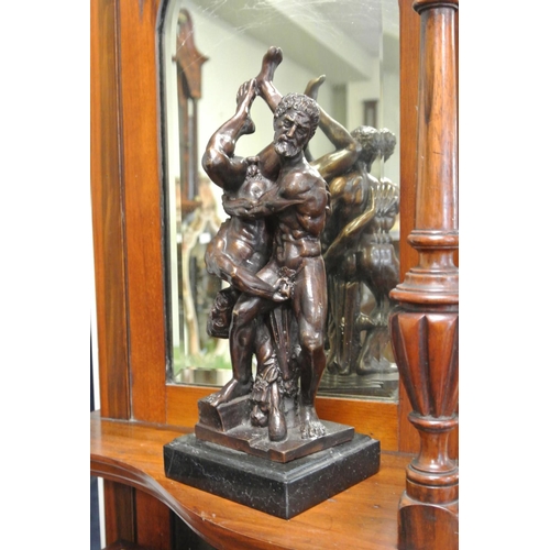 246 - A small bronze statue titled 'The Lovers Embrace' mounted on marble base.