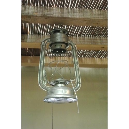 408 - A vintage metal hurricane lamp.