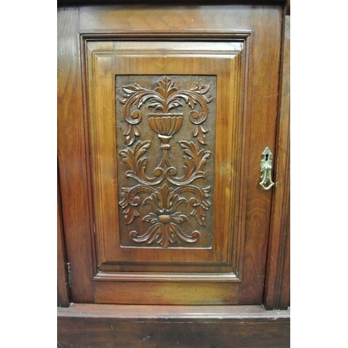 423 - A stunning antique Victorian/ Edwardian mirror back display cabinet with decorative carved panels.