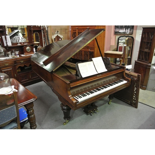 444 - A stunning antique grand piano, produced by Winklemann.