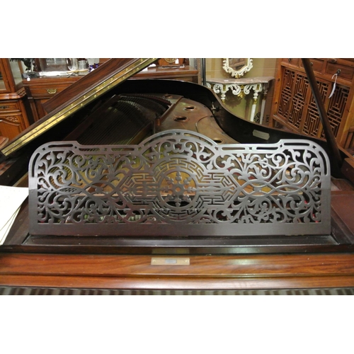 444 - A stunning antique grand piano, produced by Winklemann.