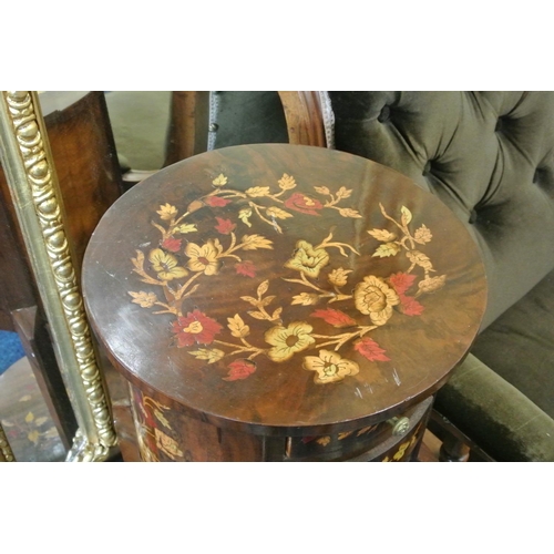 69 - An antique style circular topped occasional/ telephone table with decorative design & 3 drawers.