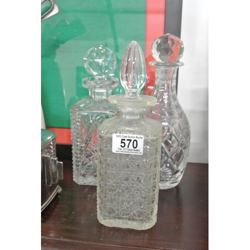 570 - A collection of 3 vintage/ antique glass & crystal decanters.