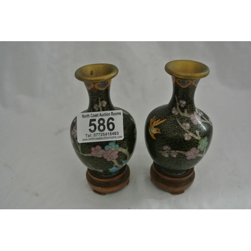 586 - A small pair of Cloisonne vases.