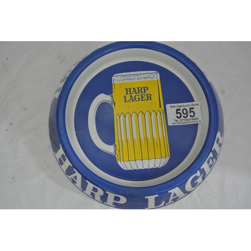 595 - A vintage tin Harp Lager ashtray.