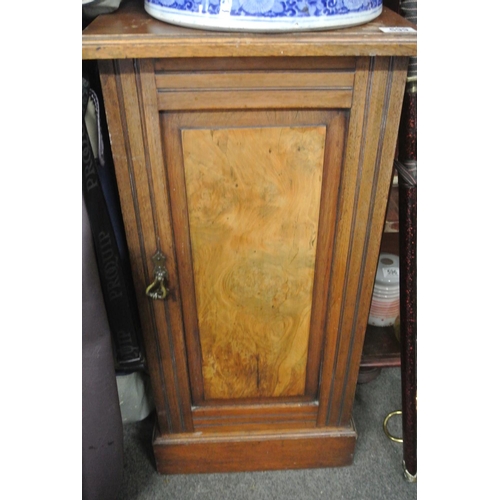 599 - An antique bedside locker.