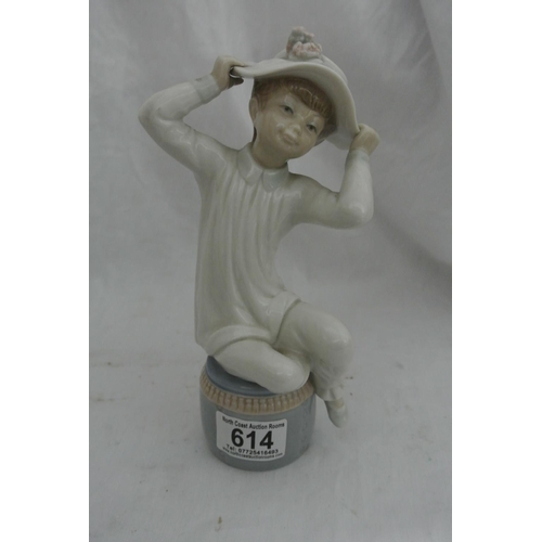 614 - A Lladro figure of girl with hat.