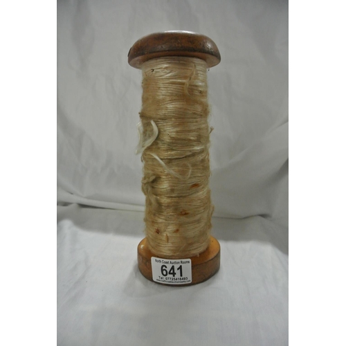 641 - A large vintage wooden spool.