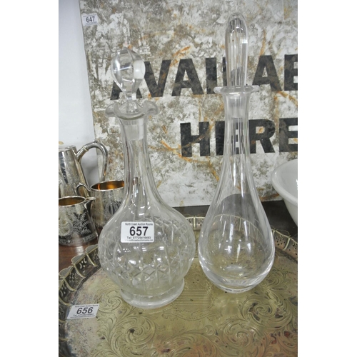 657 - 2 glass decanters.