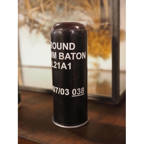 139 - A 37mm Baton round/ rubber bullet.