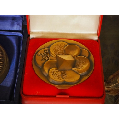 180 - 2 cased commemorative bronze medals.