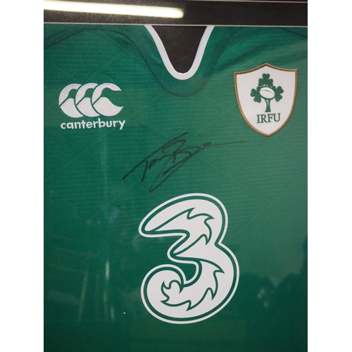 220 - A framed Irish Rugby top, signed by Tommy Howe.