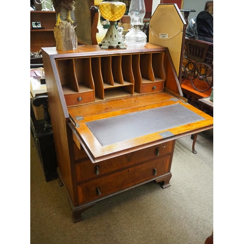 266 - An antique writing bureau.