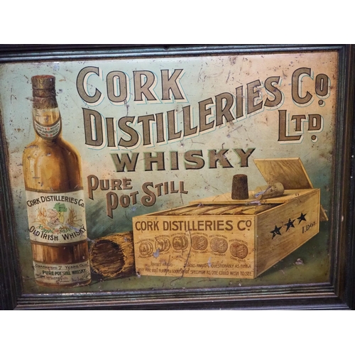 320 - An original framed metal advertising sign for Cork Distilleries Co Ltd Whisky.