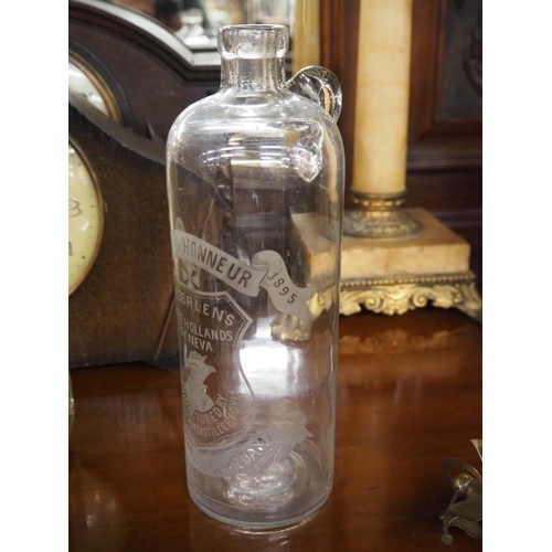 391 - An antique glass bottle produced by Amsterdam Croix D'Honneur, dating around 1895.