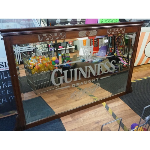 107 - A large Guinness Draught mirror.