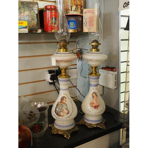 161 - A stunning pair of large antique glass oil lamps with Napoleon & Josephine.
