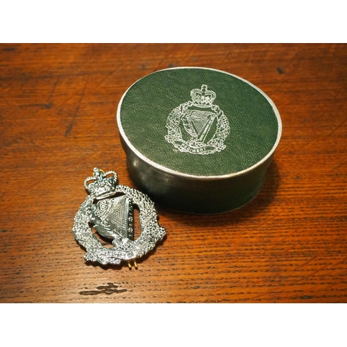 174 - A military Regiment cap badge in original box.