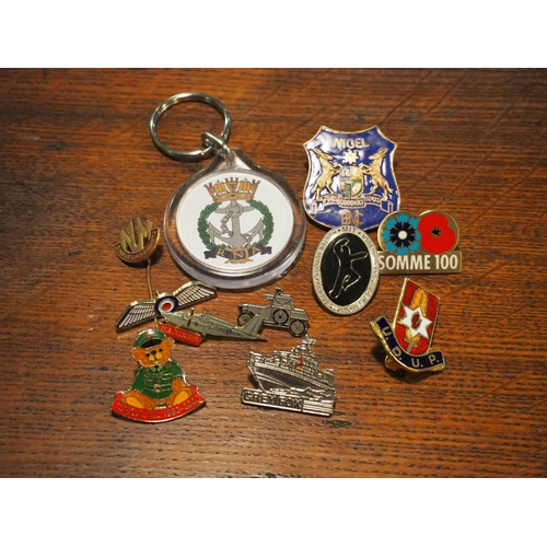 178 - An assortment of various Military badges/ keyrings.