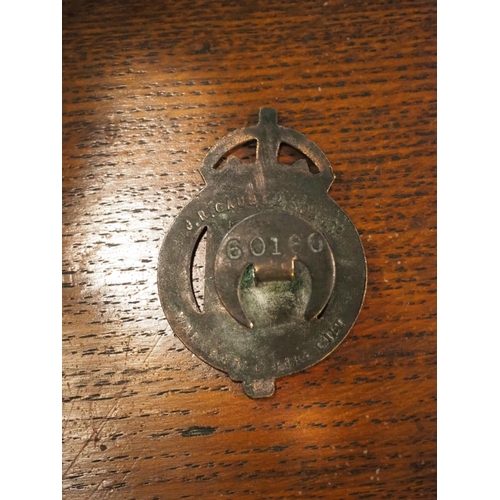 189 - A WW1 War Munitions Volunteer collar/ lapel badge.