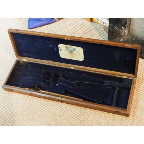 265 - An antique wooden shotgun case.