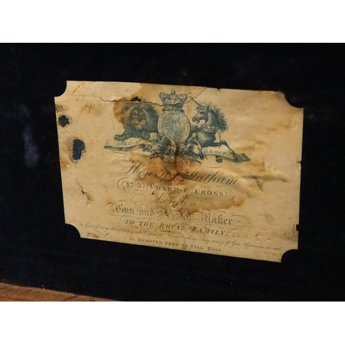 265 - An antique wooden shotgun case.