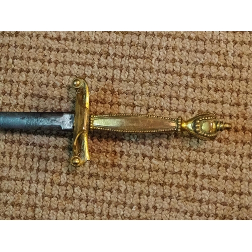 268 - A brass handled sword.