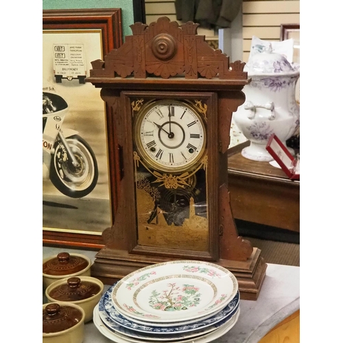 307 - An antique Gingerbread clock.