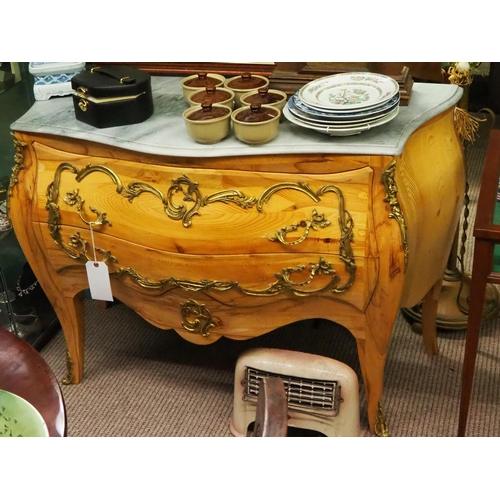 308 - A decorative Bombe front chest of drawers with marble top.