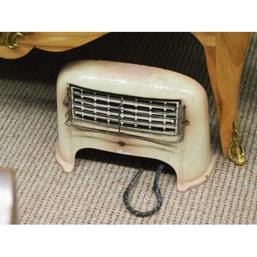 309 - A vintage enamel heater.