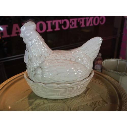 80 - A ceramic hen egg basket.