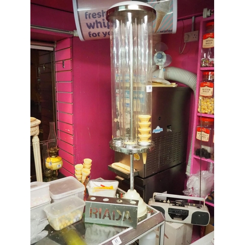 86 - An ice cream cone dispenser & stand.