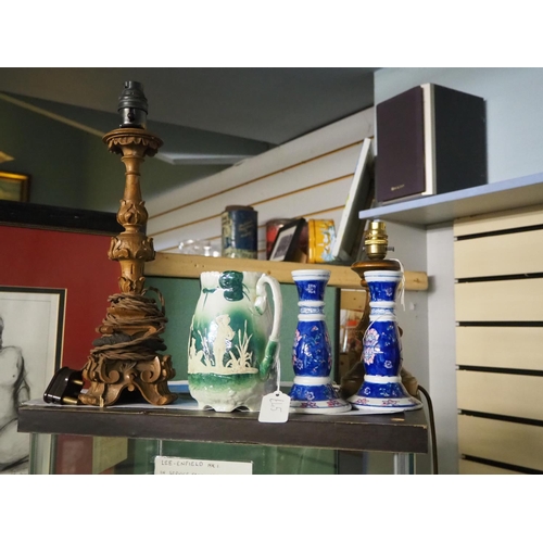 335 - An antique jug, pair of ceramic candlesticks & table lamp base.