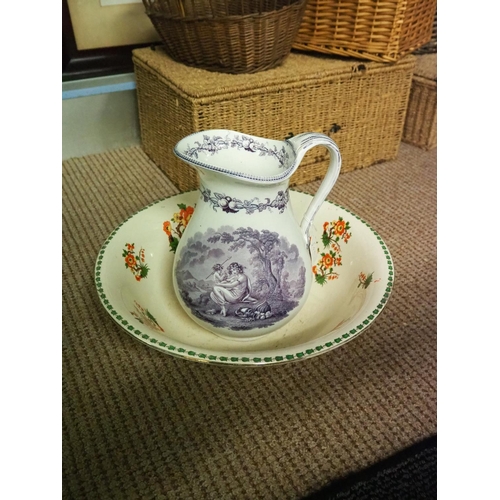 344 - An antique jug & basin.