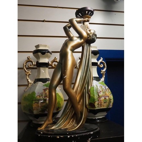 390 - An antique style Art Deco figure.