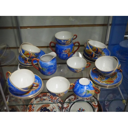 392 - A decorative Chinese/ Japanese teaset.