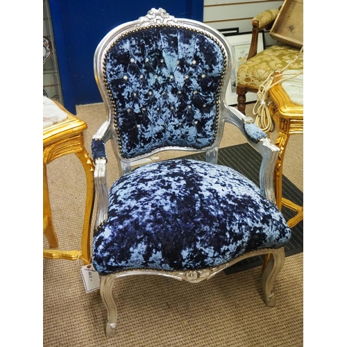 395 - An antique style chair with blue crushed velvet upholstery.