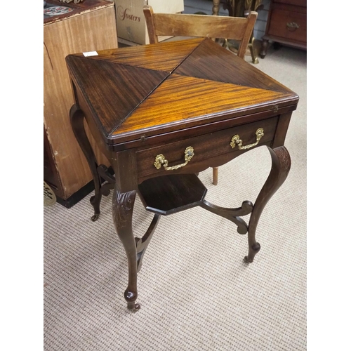 403 - An antique envelope games table.