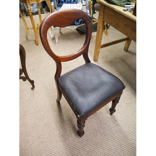 421 - An antique Victorian balloon back chair.