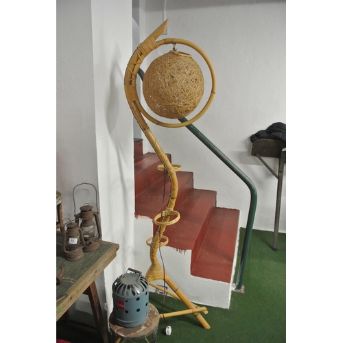 732 - A vintage/ retro wicker/ bamboo standard lamp with wicker ball shade & space for 3 plant pots.