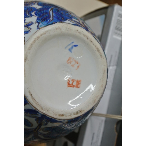 200 - A blue and gilted flower vase