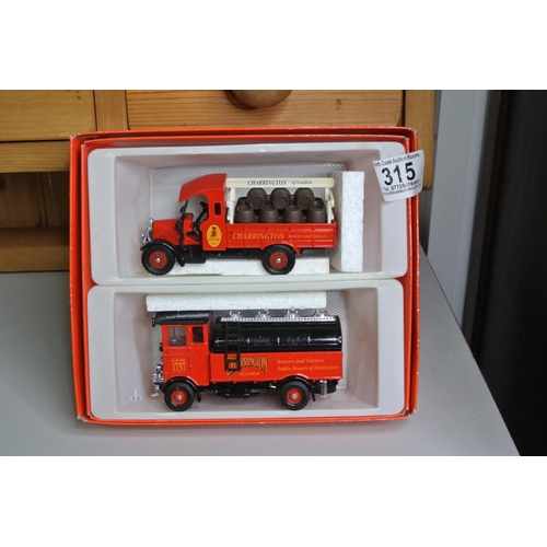 315 - A double Corgi boxset containing 2 Charrington Brewery trucks.