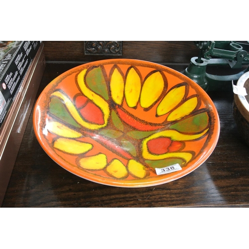 338 - A vintage Poole Pottery bowl, with signature to base