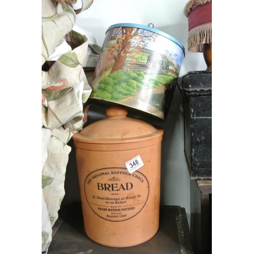 348 - A terracotta bread crock along with a tin biscuit barrel
