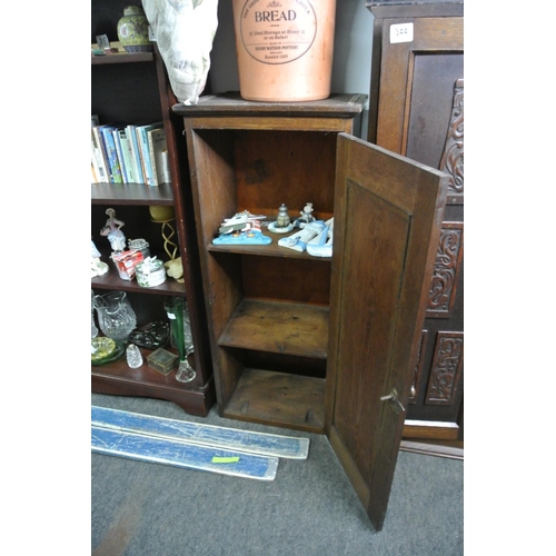 349 - An dark oak bedroom cupboard