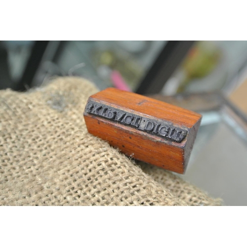 410 - A vintage stamper