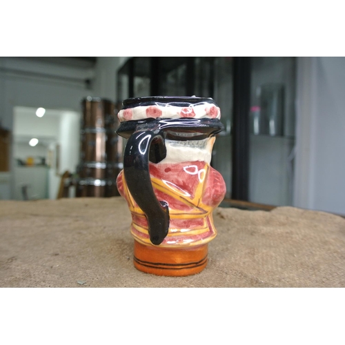 422 - A Staffordshire toby jug