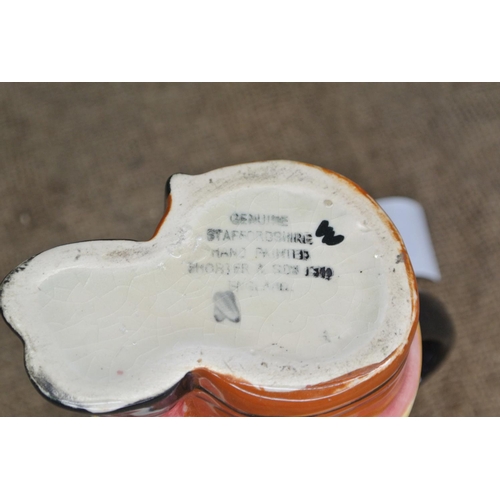 422 - A Staffordshire toby jug