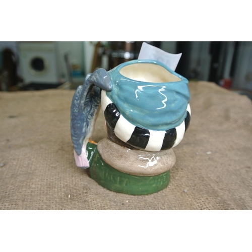 423 - A Royal Doulton 'The Falconer' toby jug