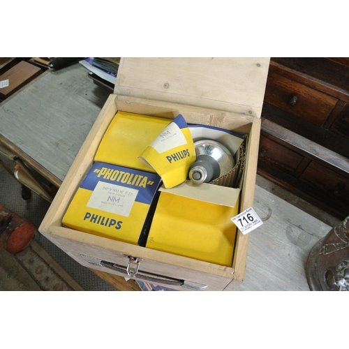 716 - A wooden lidded storage box containing four Philips 240V Photolita bulbs